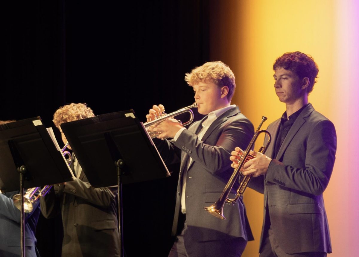 As lead trumpet player, sophomore Adrien Keune plays the high notes at the Jazz Band performance. The band prepared extensively, meeting four days a week. “Jazz concerts are fun because we put all our hard work into just a few songs, and everyone who comes always enjoys them a lot,” Keune said. “But they are still scary, and I'm still a little bit nervous.”
