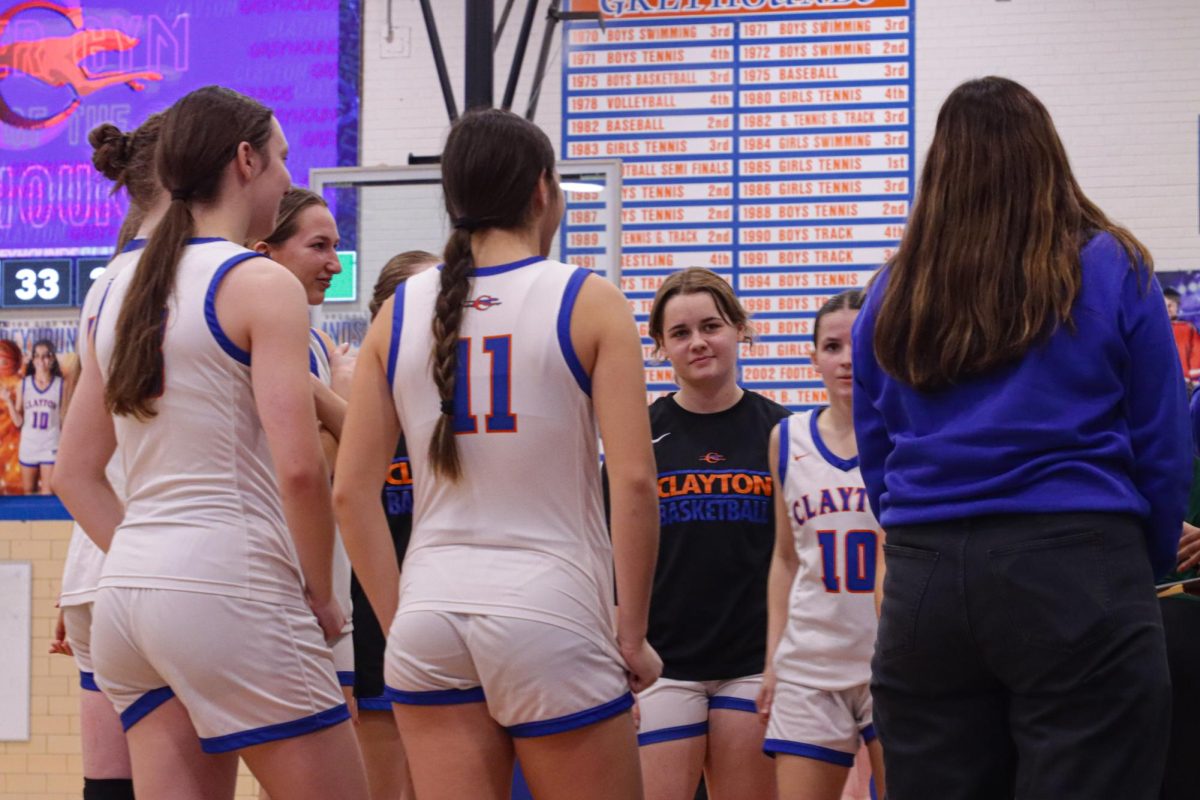 The varsity girls basketball team huddles before their game, a familiar routine for seniors Mari Gordon, Elliot Becker and Tess Krieger. The trio has played on the same basketball teams since third grade. “Playing with them is making my senior season very special. I've become really close to [them] and am excited for the rest of the season with them,” Gordon said. “Basketball this year has been a lot of fun, largely due to the team dynamic.”