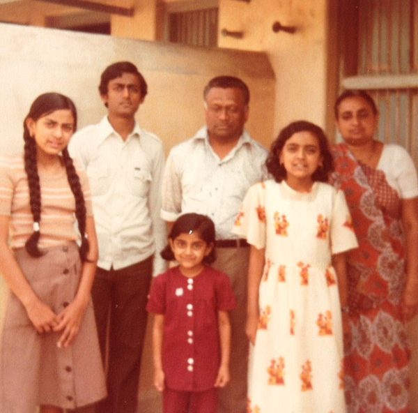 Superintendent Nisha Patel joins her siblings and parents during a summer visit to see her grandparents in India. The photo was taken on the balcony of her grandmother's home and is one of the few family photos from her childhood.