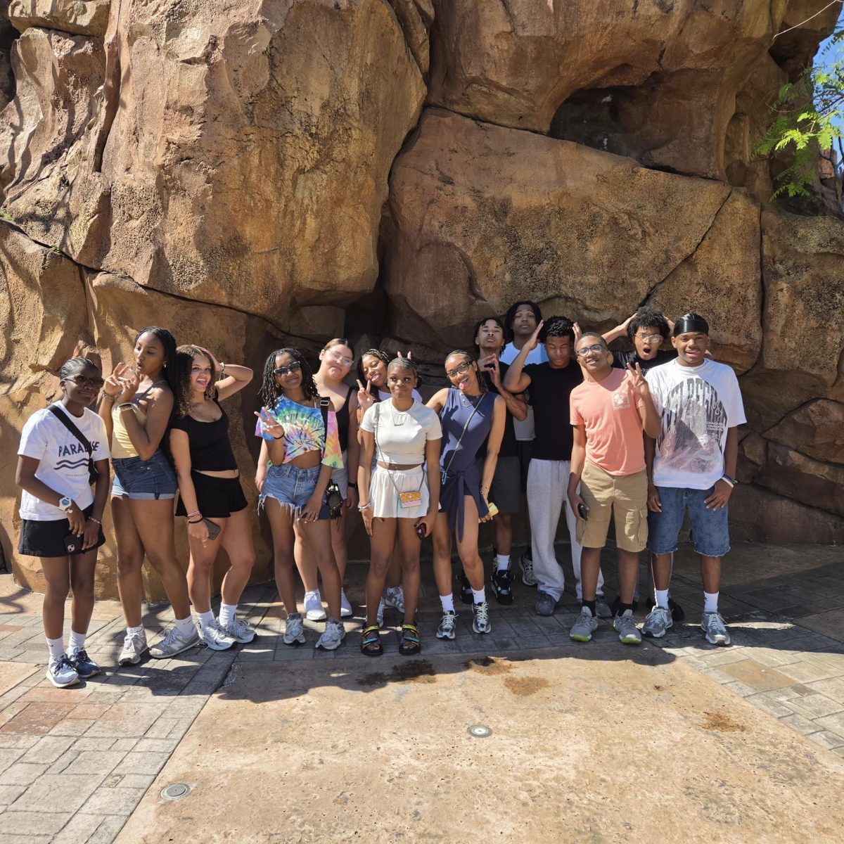 Clayton students take a break from campus tours to enjoy the rides and food on a sunny day at Universal Studios Orlando during the annual HBCU trip.